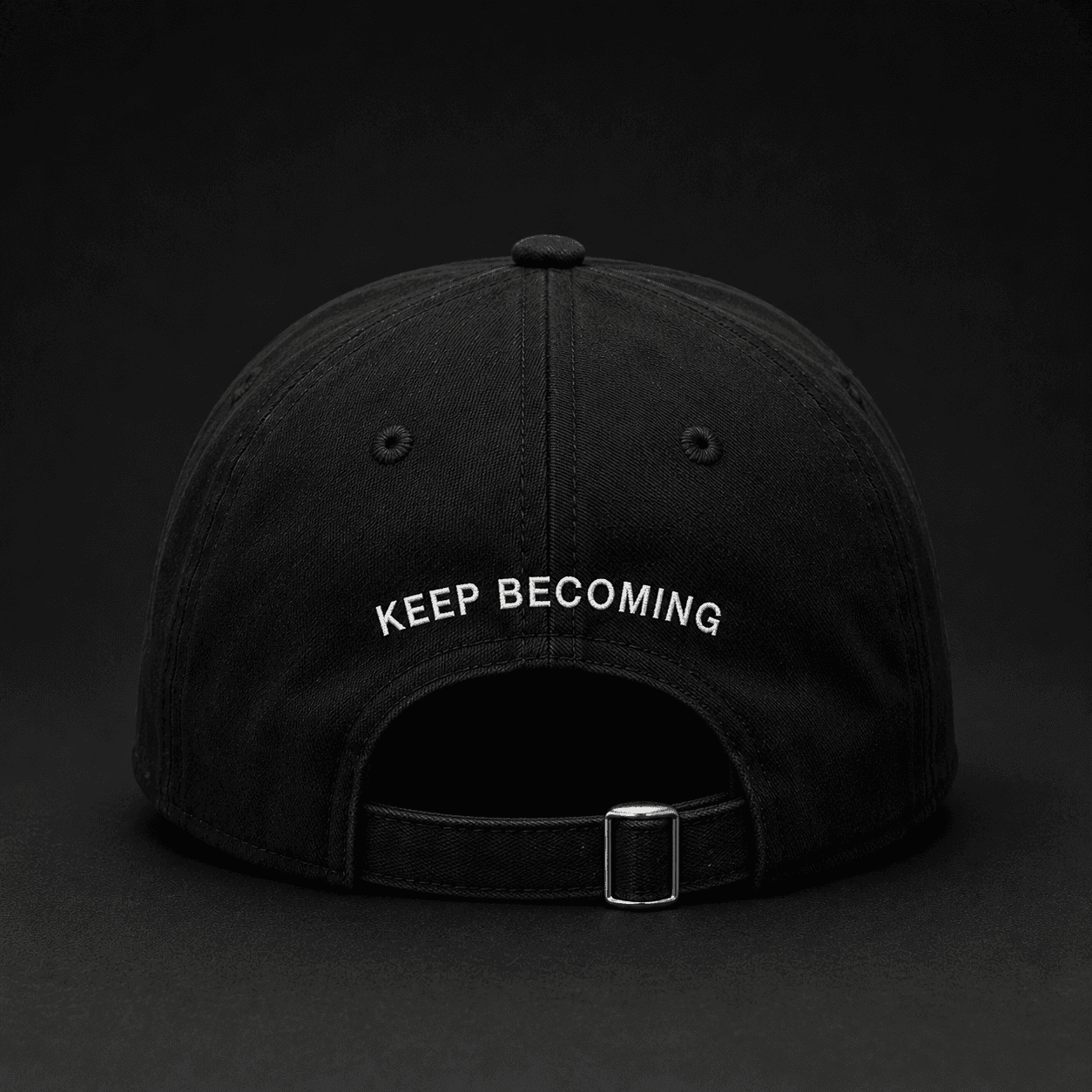Young Leo cap with Keep Becoming embroidered across the back